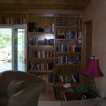 Custom bookcases flanking the French doors on the right side